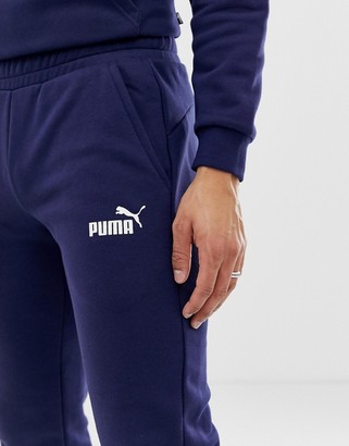 Puma Essentials skinny fit joggers in navy