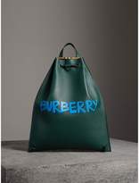 Thumbnail for your product : Burberry Graffiti Print Bonded Leather Drawcord Backpack