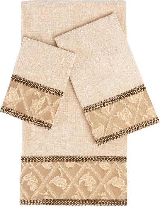 https://img.shopstyle-cdn.com/sim/2c/9c/2c9cf03f78c1f76a65cd0613219d80ac_best/sherry-kline-prescott-brown-3-piece-decorative-towel-set-jacquard-fabric-band-double-row-of-gimp-braid-1-bath-hand-tip-towel.jpg
