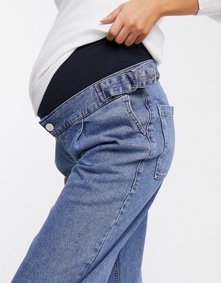ASOS DESIGN Maternity tapered boyfriend jeans with d-ring waist detail with curved seams in blue with over the bump bump