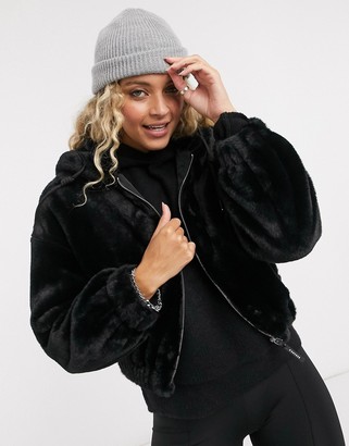 Bershka faux fur cropped jacket in black - ShopStyle