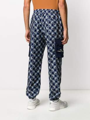 Fila All-Over Logo Print Loose Fit Track Pants