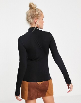Stradivarius jersey roll neck top in black - ShopStyle