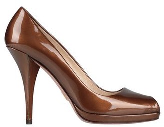 prada gold pumps