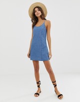 Thumbnail for your product : ASOS DESIGN denim sundress with tie back in midwash blue