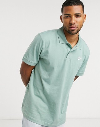 green nike polo shirt