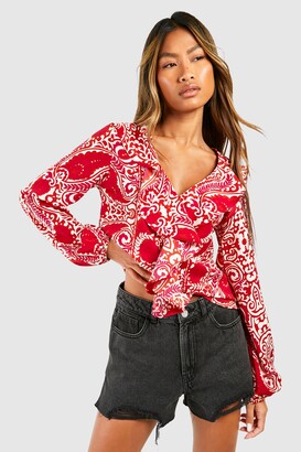 red ruffle blouse