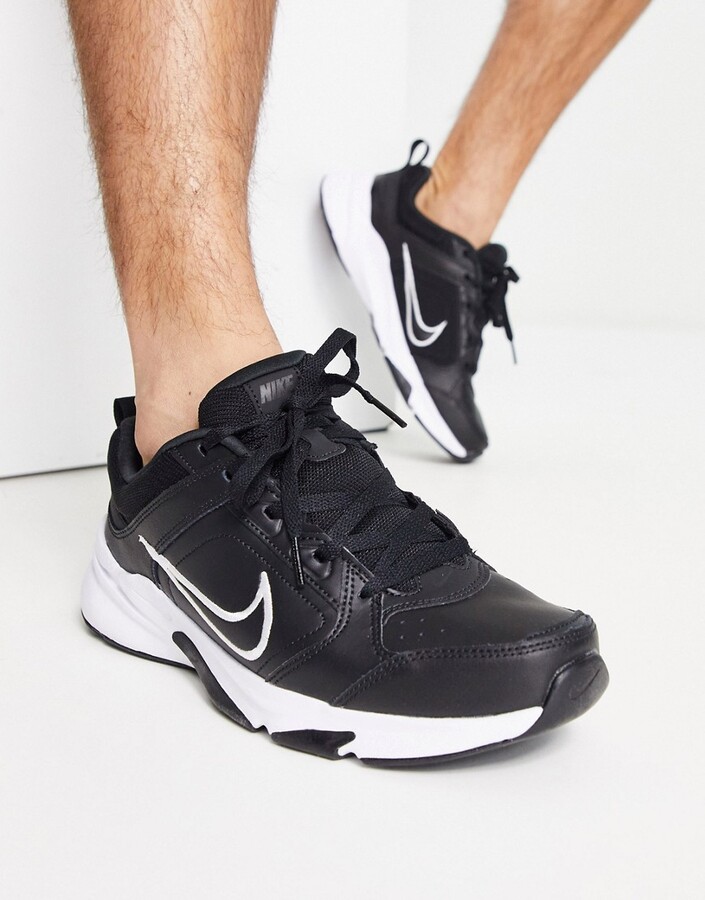Nike Training Defy All Day trainers in black and white ShopStyle