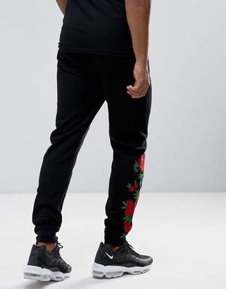 ASOS DESIGN Skinny Joggers with Rose Embroidery