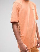 Thumbnail for your product : Puma T-Shirt In Orange Exclusive to ASOS