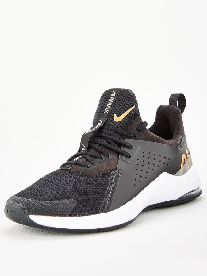 womens black and gold nike trainers