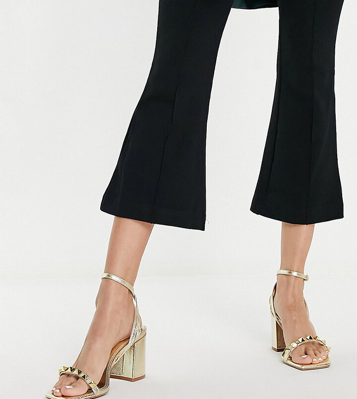 ASOS DESIGN Wide Fit Holt studded mid heeled sandals in gold - ShopStyle