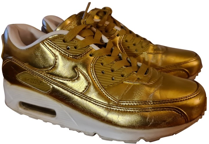 nike golden sneakers