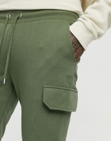 Thumbnail for your product : ASOS DESIGN skinny joggers with cargo pockets in khaki