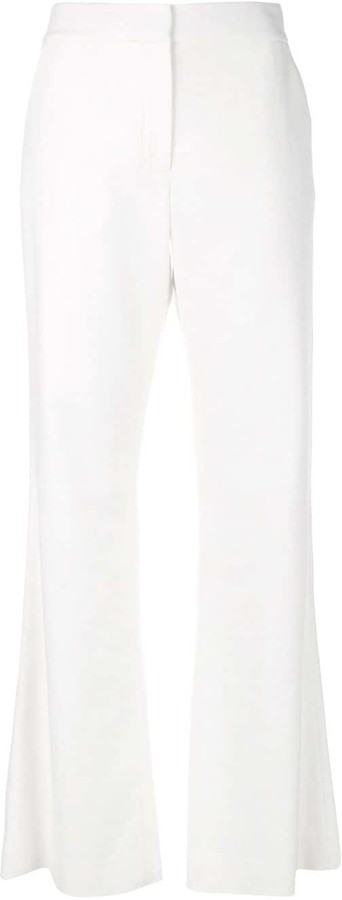 cream bootleg trousers