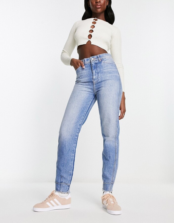 https://img.shopstyle-cdn.com/sim/2f/00/2f00964c68d714e4546c31134088e527_best/free-people-marion-high-waisted-mom-jeans-in-blue.jpg