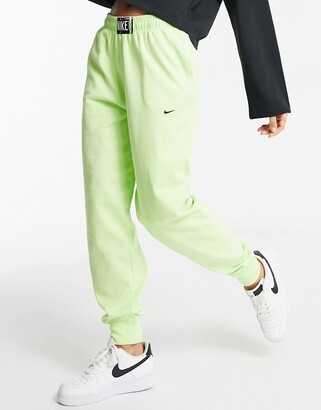 Nike washed high rise sweatpants in neon green - ShopStyle Pants