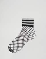 Thumbnail for your product : ASOS Fishnet Glitter Stripe Welt Socks