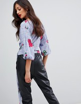 Thumbnail for your product : AX Paris tie front 3/4 sleeve top in rose print