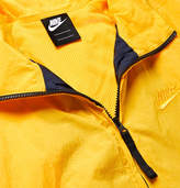 Thumbnail for your product : Nike Logo-Print Colour-Block Nylon Track Jacket - Men - Yellow