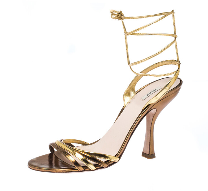 gold sandals wrap around