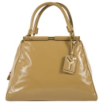 Saint Laurent Yellow Patent leather Handbags
