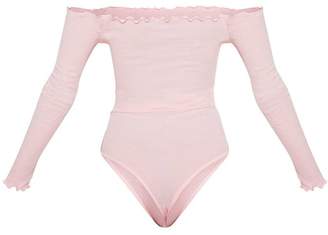 PrettyLittleThing Baby Pink Frill Edge Long Sleeve Thong Bodysuit