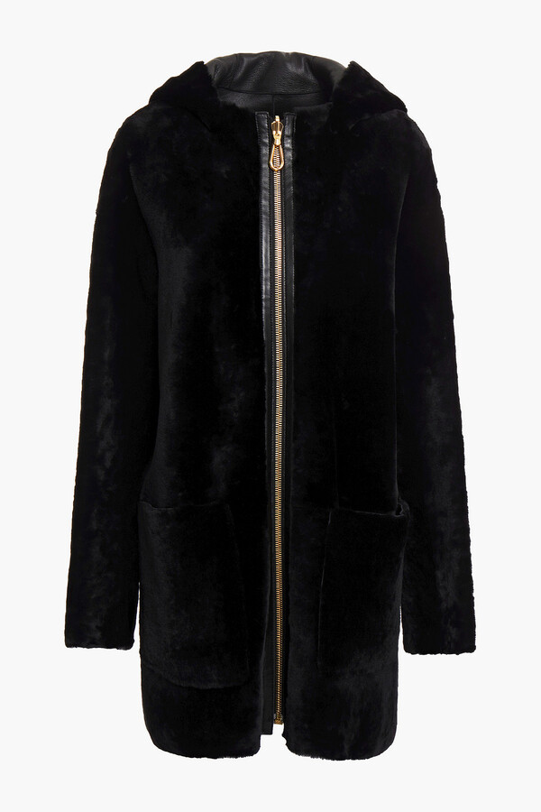 Sandro Reversible leather-trimmed shearling coat ShopStyle