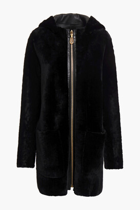 Sandro Reversible leather-trimmed shearling coat ShopStyle