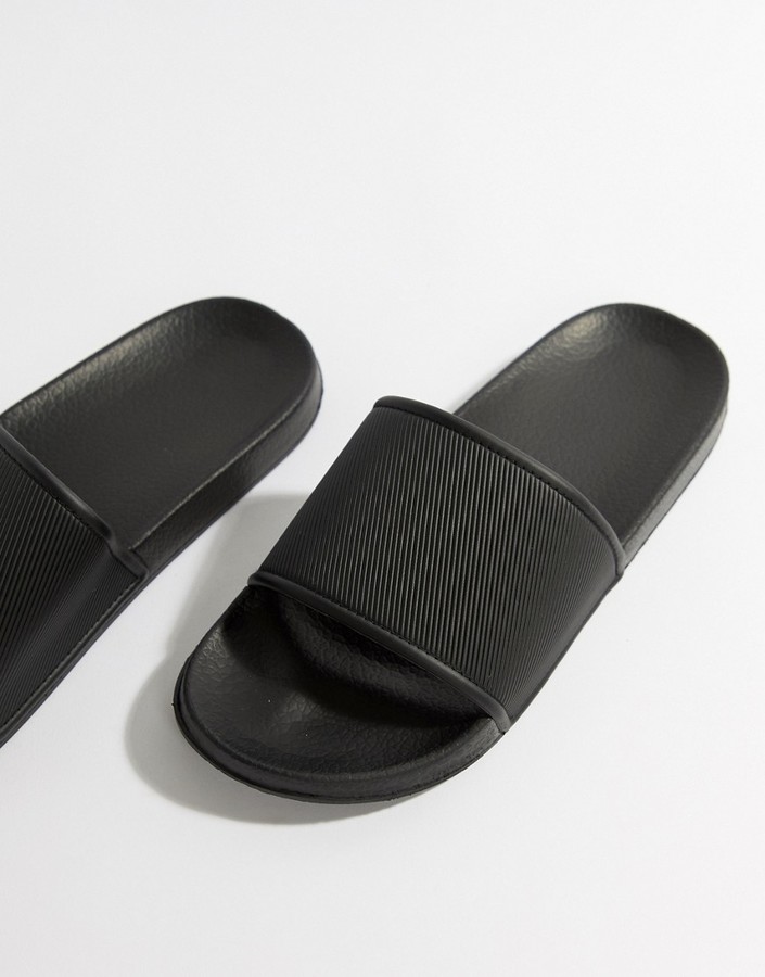 ASOS DESIGN sliders in black - ShopStyle Sandals