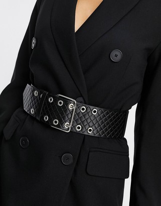 ASOS DESIGN wide double prong buckle belt in black quilt design