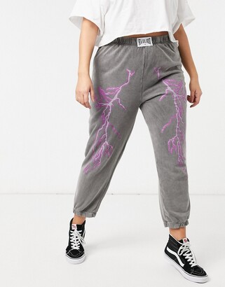 New Girl Order Curve relaxed joggers with lightning print in vintage wash co-ord