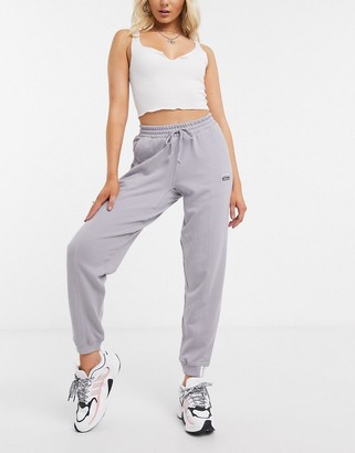 adidas RYV cuffed sweatpants in black - ShopStyle Activewear Pants