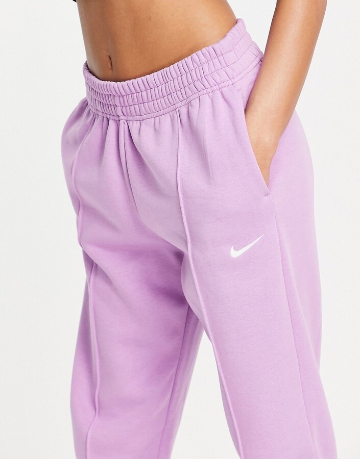 Nike mini swoosh oversized jogger in violet purple - ShopStyle Activewear  Trousers