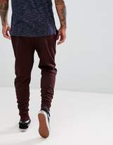 Thumbnail for your product : ASOS Tapered Joggers In Burgundy