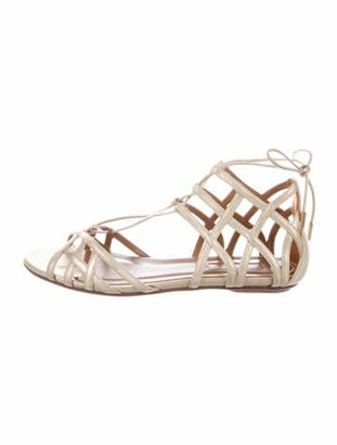 red and gold gladiator sandals