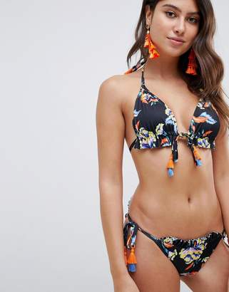 ASOS DESIGN recycled tie side tassel frill bikini bottom in wild tropical print
