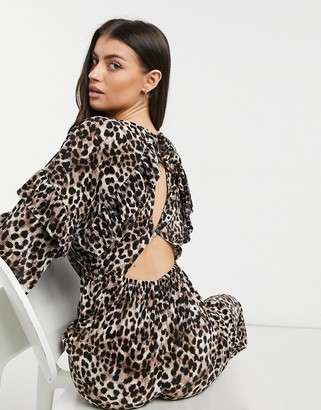 ASOS DESIGN frill open back long-sleeved plisse tea jumpsuit in leopard print
