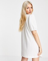 Thumbnail for your product : ASOS DESIGN crochet trim v neck mini dress with horn buttons in cream