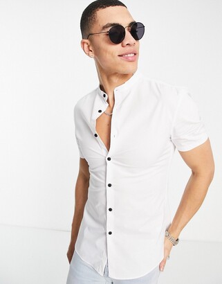 ASOS DESIGN super skinny muscle fit shirt with contrast buttons in white -  ShopStyle