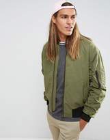 Thumbnail for your product : ASOS DESIGN Oversized Bomber Jacket With Ruche Detail and Back Print in Khaki