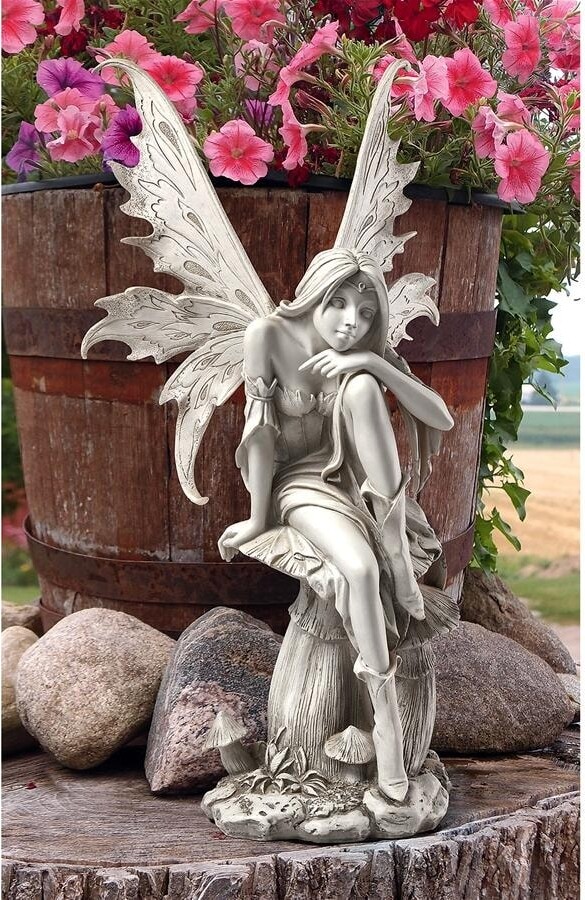 https://img.shopstyle-cdn.com/sim/30/cd/30cdc7618c2c5b7c13cdc93e4e63c7f6_best/design-toscano-fairy-of-hopes-and-dreams-garden-statue-by-artist-cecelia.jpg