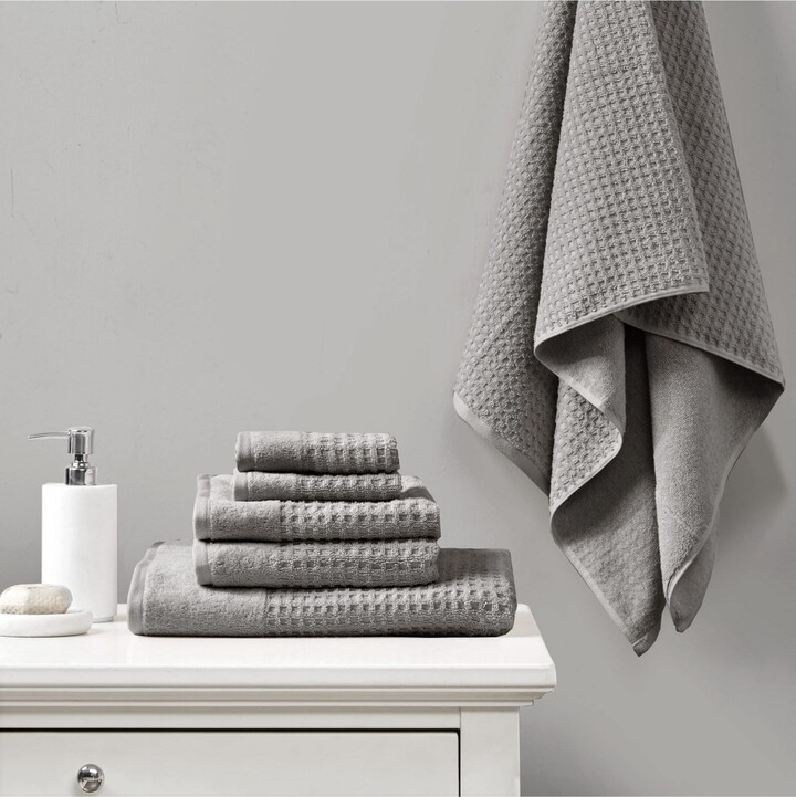 https://img.shopstyle-cdn.com/sim/30/d0/30d00a61eb18729e186476416924f129_best/gracie-mills-100-cotton-luxurious-towel-set-premium-texture-waffle-weave-highly-absorbent-quick-dry-hotel-spa-quality-wash-clothes-for-bathroom-assorted-siz.jpg