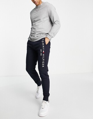 Tommy Hilfiger embroidered flag logo cuffed joggers in navy - ShopStyle  Trousers