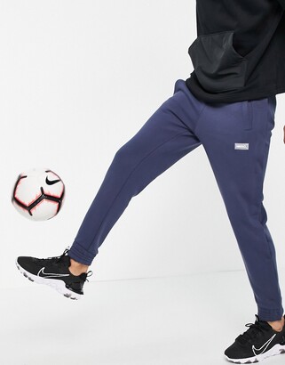 Nike Football Nike FC fleece track pants in blue - ShopStyle Activewear  Trousers
