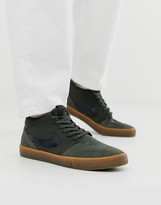nike sb black portmore ii trainers with gum sole