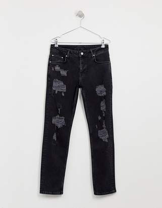 ASOS Design DESIGN slim jeans in washed black with heavy rips