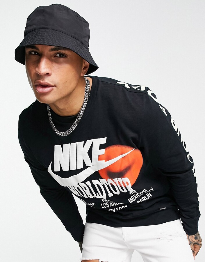 Nike World Tour Pack graphic print long sleeve t-shirt in black - ShopStyle