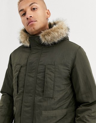 ASOS DESIGN parka jacket in green with faux fur lining