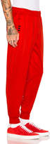 Thumbnail for your product : Alexander Wang Adidas By adidas by Track Pant in Core Red & Black | FWRD